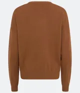 Buzo amarillo de algodón de punto, manga larga y sisa desplazada.