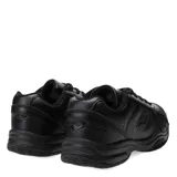 Championes Lotto de cuero color negro, con cordones y logo de la marca en el lateral.