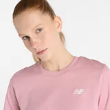 Remera de algodón color rosa con logo de New Balance estampado en el pecho.