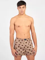 Bóxer de algodón color beige con estampado de corazones marrones, cintura elastizada con logo de la marca.