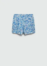 Short de tiro medio con estampado floral en tonos celeste y blanco.