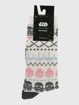 Calcetines largos color crema con puño, talón y puntera en gris oscuro. Diseño con motivos de Star Wars: cascos de Stormtroopers, naves Millennium Falcon y X-Wing, y sables de luz.