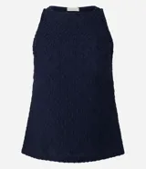 Musculosa azul marino texturizada con cuello halter.
