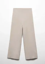 Pantalón crop color beige, de lino y viscosa, con corte wide leg y cintura elástica.
