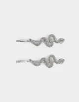 Set de dos horquillas plateadas con forma de serpiente y apliques de strass.