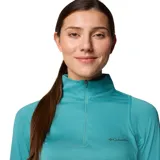 Remera deportiva Columbia negra de manga larga con medio cierre frontal y tecnología Omni-Wick para control de la humedad y neutralización de olores.