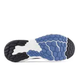 Championes de running New Balance Evoz V4, color celeste con detalles en azul marino y blanco.