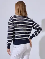 Cardigan de tejido combinado en colores naranja y rosa, con escote en V y cierre de botones frontal.