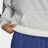 Canguro Adidas gris con capucha, cordón ajustable, bolsillo tipo canguro, hombros caídos, puños y dobladillo acanalados, dobladillo trasero ligeramente más corto y las icónicas tres rayas negras en las mangas.