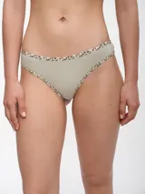 Colaless blanca de algodón con ribete de animal print.