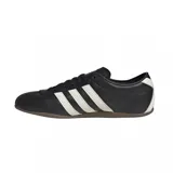 Championes Adidas Tokyo de cuero negro con las tres tiras laterales en blanco y suela marrón.