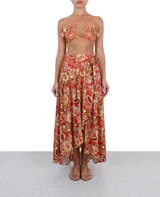 Falda larga de viscosa con estampado floral en tonos naranja, amarillo y marrón.