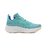 Zapatillas deportivas Le Groupe de dama color negro, con detalles en blanco y suela gruesa.