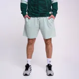 Short sin costuras en color menta, con cintura elástica y bolsillos laterales.