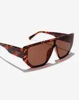 Lentes de sol unisex Hawkers modelo Metro, con montura carey marrón y lentes marrones.