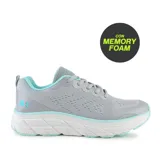 Championes deportivos celestes con detalles en rosa, suela blanca y tecnología memory foam.