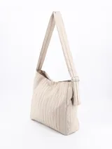 Bandolera color beige con correa ancha regulable y monedero extraíble con cierre.