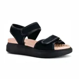 Sandalias negras con plataforma baja y ajuste con velcro.
