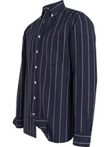 Camisa de manga larga Tommy Hilfiger de corte regular, confeccionada en algodón a rayas verticales azul marino, rojas y blancas. Presenta cuello abotonado, bolsillo de parche en el pecho y logo bordado en la manga.