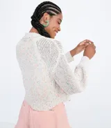 Campera corta de tejido de punto multicolor con mangas abullonadas y puños ajustados.
