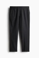 Pantalón sastrero tobillero color gris oscuro, corte slim fit, con elástico en la cintura, bolsillos laterales y traseros ribeteados.