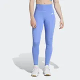 Calza larga de entrenamiento Adidas, color celeste con logo blanco en la pierna izquierda.