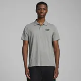 Polo Puma ESS Nº1 de jersey color gris con logo negro bordado en el pecho.