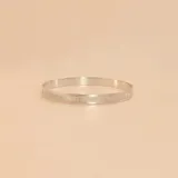 Esclava de plata 925 con cinta satinada y opción de grabado personalizado.