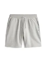 Pantalón corto deportivo gris de felpa, con cintura elástica ajustable con cordón, bolsillos laterales y logo de Tommy Hilfiger bordado en el ruedo.