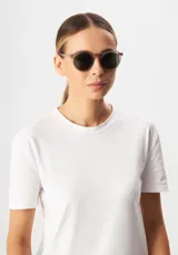 Gafas de sol redondas Eco Shades modelo Fontana, con montura de acetato biodegradable color verde oscuro y lentes grises de PMMA reciclado con protección UV 400.