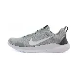 Championes de running Nike Flex Experience RN 12, color gris claro con detalles en blanco y negro.