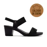 Sandalia de cuero negra con taco bajo y tiras elásticas.