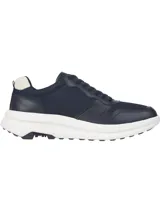 Zapatillas deportivas Tommy Hilfiger color azul marino, con exterior de malla y cuero sintético, suela gruesa blanca y detalles en blanco en el talón.