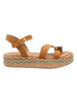Sandalias con plataforma de rafia multicolor y tiras de cuero color suela.