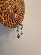 Caravanas colgantes con diseño de ojo turco, enchapadas en plata.