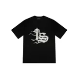 Camiseta negra de corte estándar con estampado frontal del logo de Trapstar con efecto de llamas en color blanco.