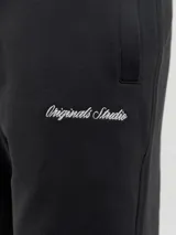 Pantalón de jogging negro de algodón con cintura elástica y cordón ajustable.