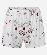 Conjunto de pijama americano corto confeccionado en algodón, compuesto por una camisa de manga corta con cuello solapa y abotonado delantero, y un short con cintura elástica y lazo. Estampado de íconos girlies como lacitos y frutillas.