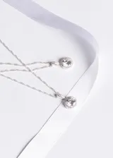 Collar de plata 925 con dije de zirconia blanca, con cadena retorcida de 45 cm de largo.