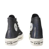 Championes de caña alta Converse Chuck Taylor All Star Lift, color negro con efecto iridiscente y plataforma blanca.