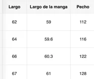 Sweater gris con efecto gastado y aplique de encaje negro con forma de mariposa en el frente.