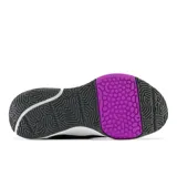 Championes New Balance FuelCell Trainer v2 de dama, color negro con detalles en celeste y fucsia.