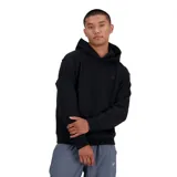 Canguro de hombre, color negro, con logo discreto de New Balance en el pecho.