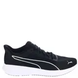 Championes Puma Transport Modern de running, color negro con detalles en blanco y suela blanca.
