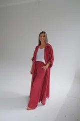 Pantalón palazzo color bordó de lino italiano, con cintura elastizada.