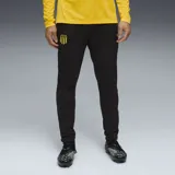 Pantalón de entrenamiento negro con logo de Puma y escudo del Club Atlético Peñarol en amarillo.