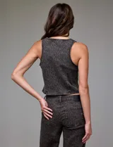 Chaleco de jean con estampado animal print, marca Hidden. Escote cuadrado, abertura central con botones.