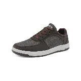 Championes urbanos grises de tela y cuero sintético, con cordones y suela blanca.