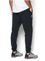 Pantalón de jogging Under Armour Sportstyle Tricot color azul petróleo, de corte ajustado, con cintura elástica ajustable con cordón y bolsillos laterales.
