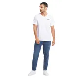 Remera Puma de hombre, color blanco, de corte clásico y cuello en V. Presenta logo de la marca bordado en el pecho.